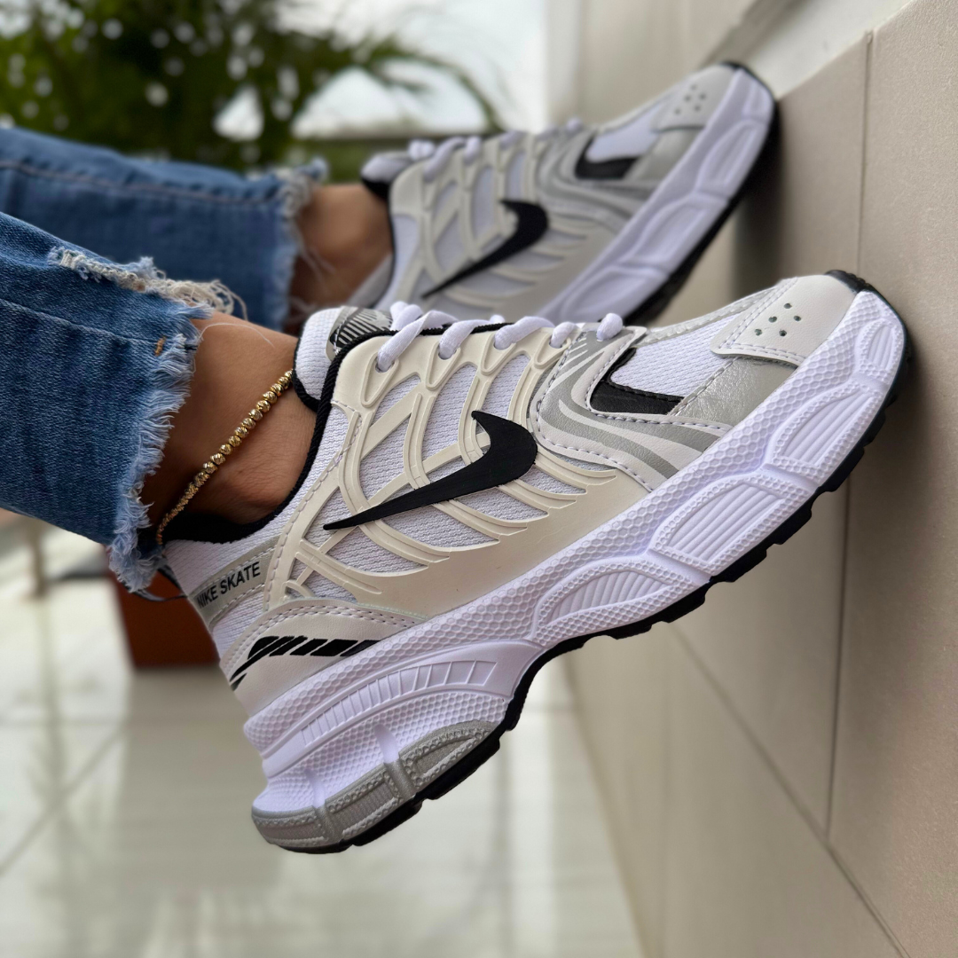 Deportivo NIKE®